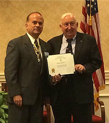 Compatriot Marv Murray receives his certificate from President Bill Price